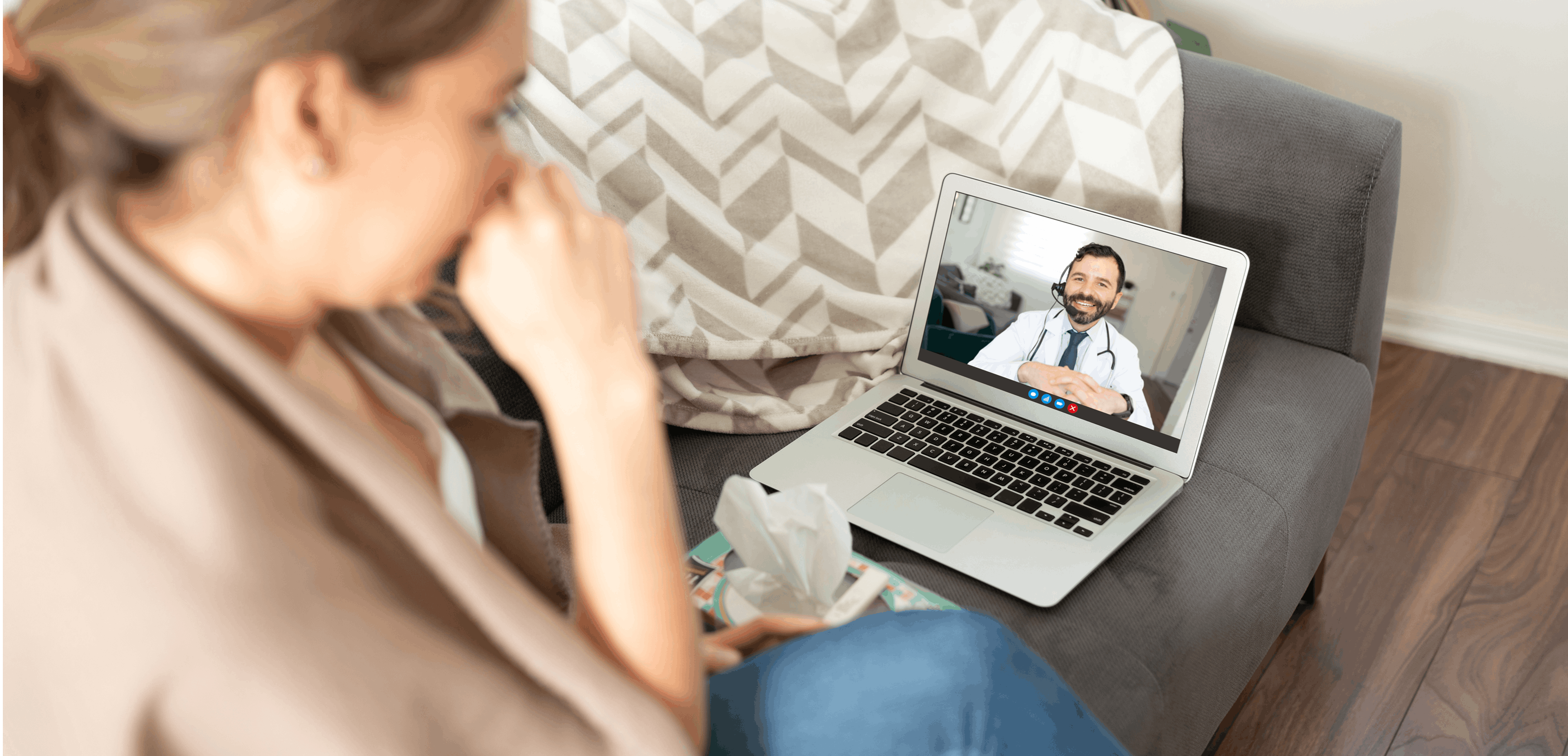 Patient speaking with a GP via video call during an online doctor consultation